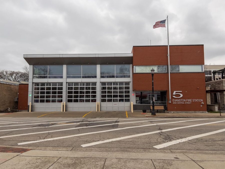 The front of the Evanston Fire Station, with the American flag blowing in the wind.
