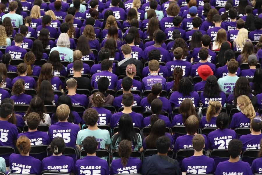 Rows of students wearing purple and teal Wildcat Welcome shirts.