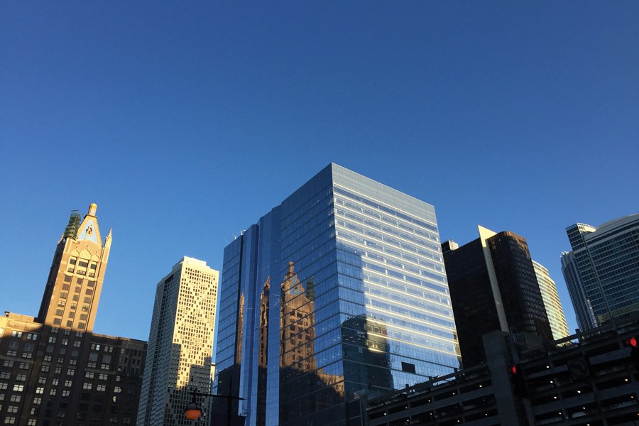 Picture+of+a+blue+building+against+a+cloudless+sky.