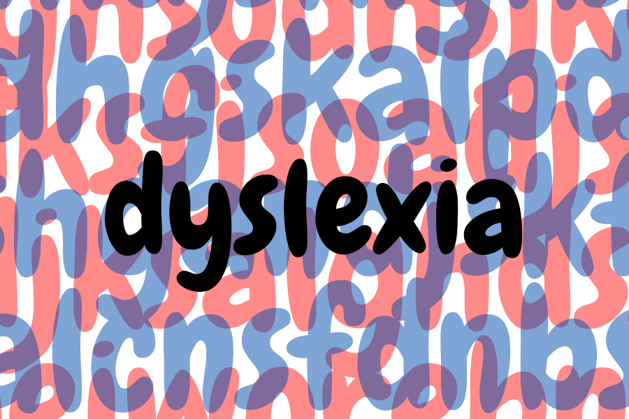 The word ‘dyslexia’ is imposed on a background of blue and red letters.