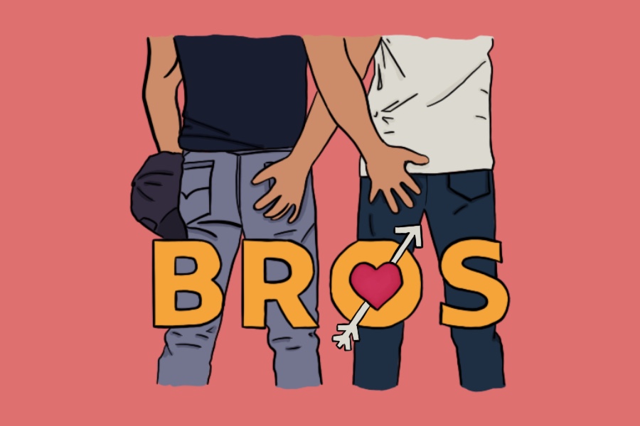 Two people wearing jeans, turned away, grab each other’s butts.