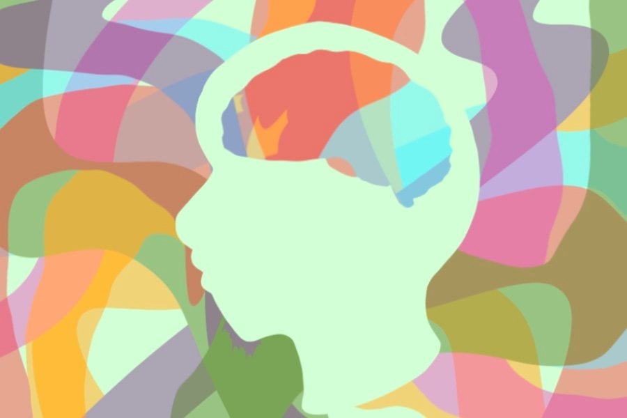 A+green+silhouette+of+a+head+and+brain+sits+on+a+background+of+colorful+shapes.
