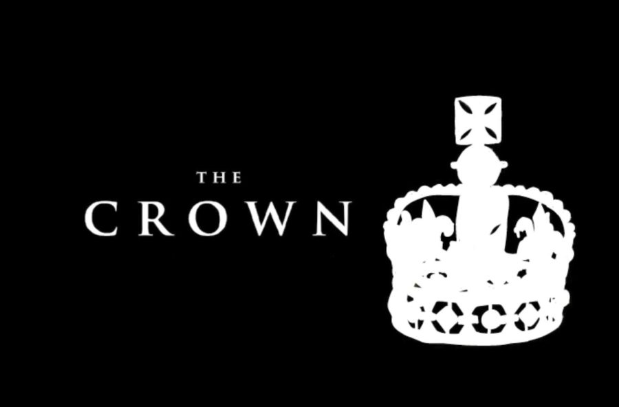 A white crown with a black backdrop.