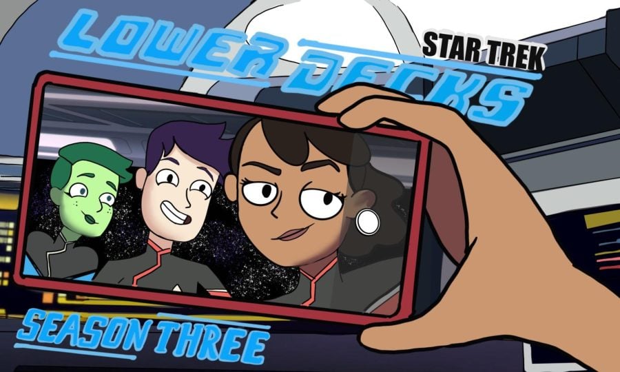 Three cartoon people — one with green skin — smile at a phone. Text on the image says “Star Trek Lower Decks season three.”