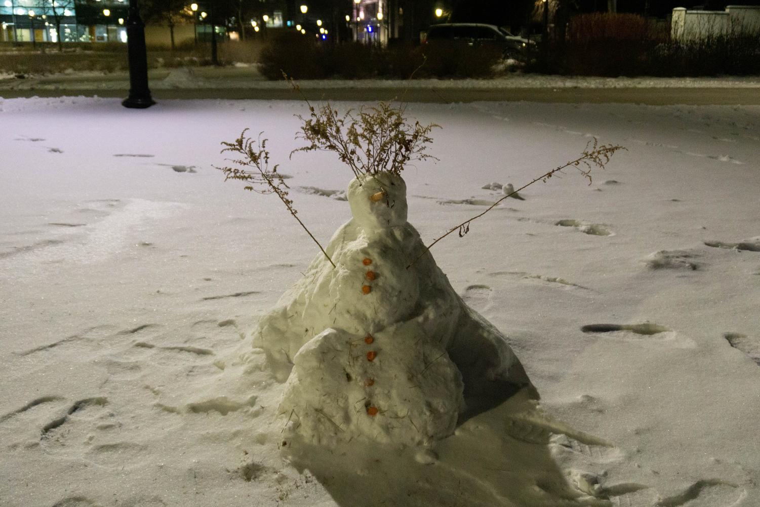 A short, cone-shaped snowman.