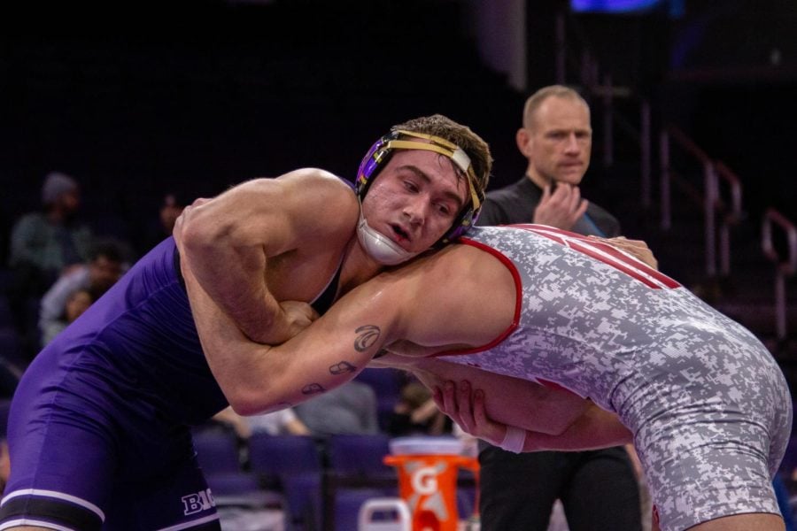 Captured: NU Wrestling remains undefeated at home after close match against Wisconsin