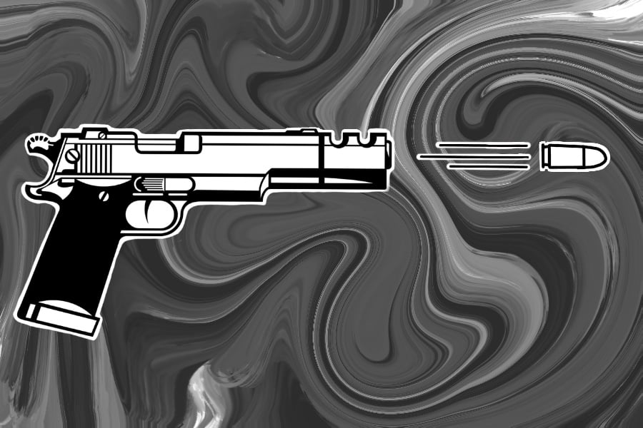 A gun having fired a bullet in front of a grey background.