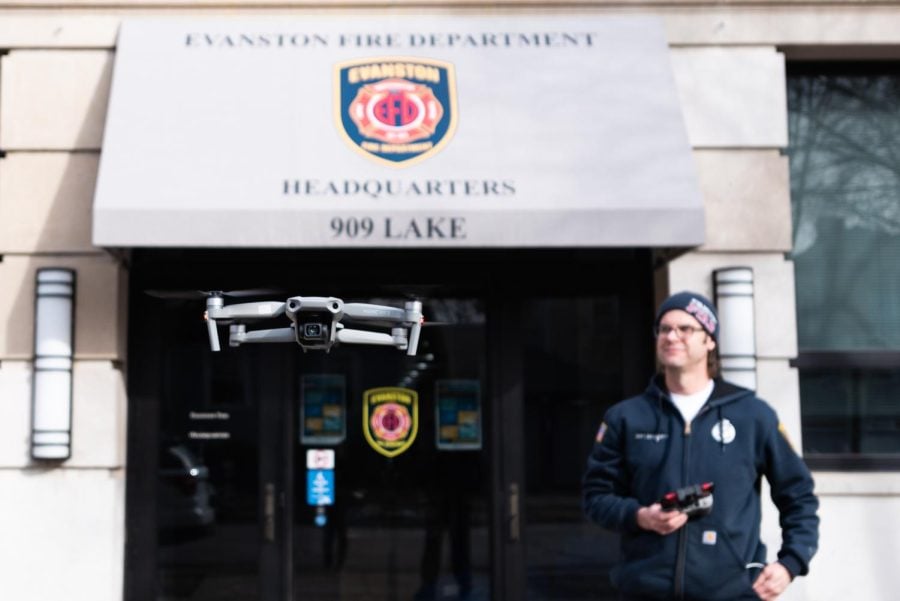 The Evanston Police and Fire Departments’ gray training drone is flown by a firefighter in front of EFD headquarters.