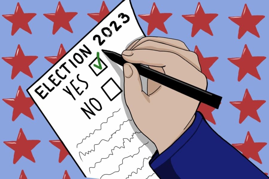 A hand fills in a ballot against a blue backdrop with red stars