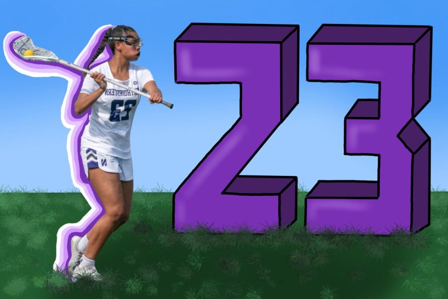 An athlete in a white jersey looks to pass a lacrosse ball from her stick.