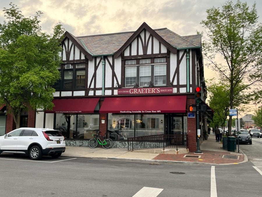A building with red awnings that say “Graeter’s” is centered in the frame.