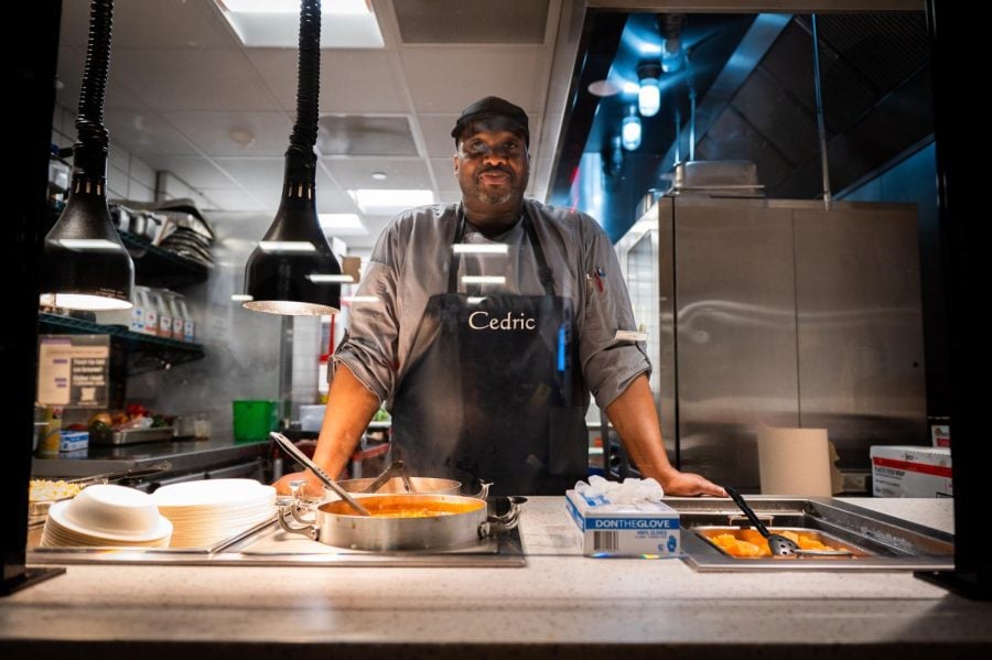 Elder chef Cedric Taylor opens his kosher station for students.