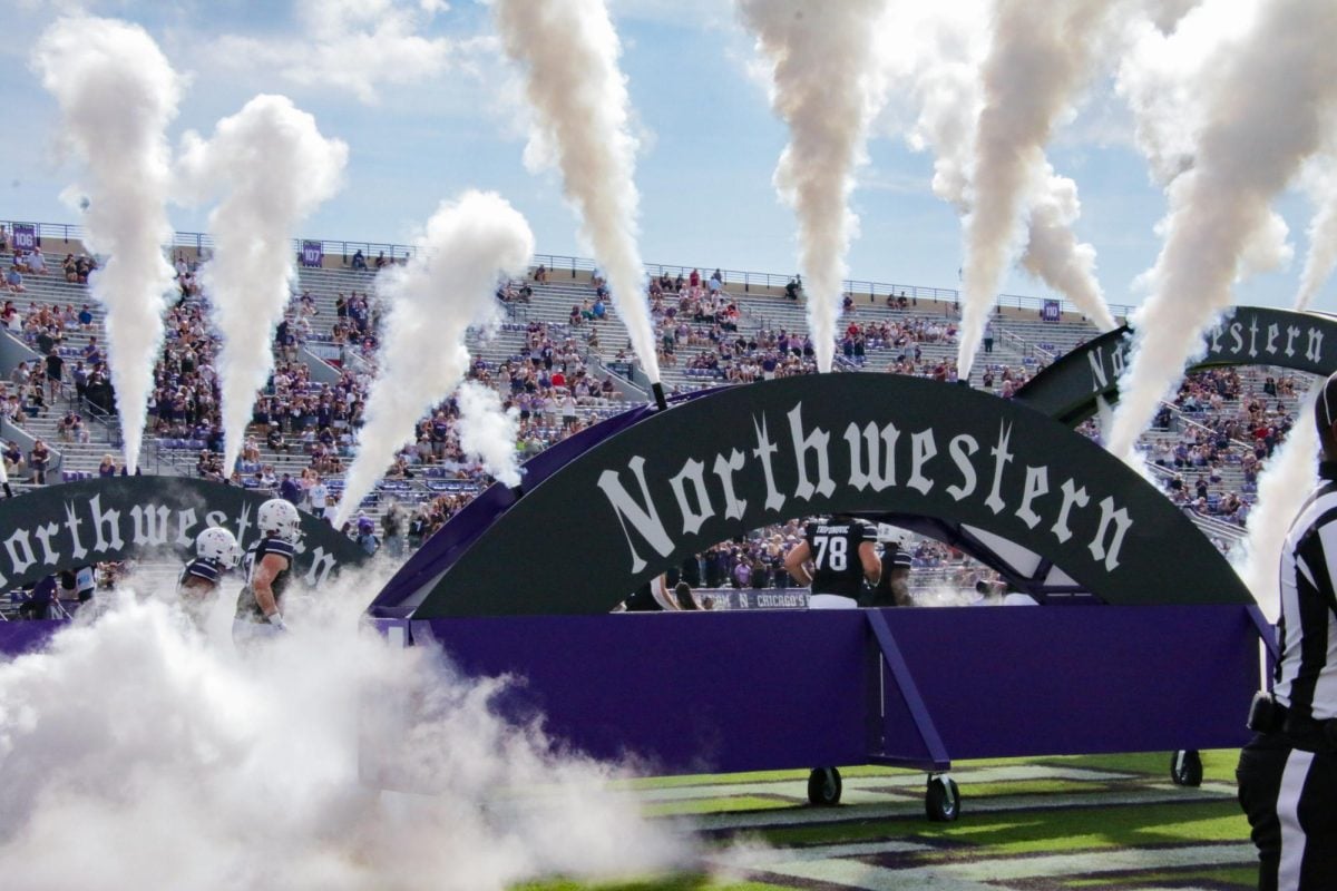 Northwestern+players+run+out+of+the+locker+room+in+last+year%E2%80%99s+matchup+versus+Duke.+In+Saturday%E2%80%99s+defeat+to+the+Blue+Devils%2C+the+Cats%E2%80%99+defense+had+trouble+stopping+Riley+Leonard+on+the+ground.+