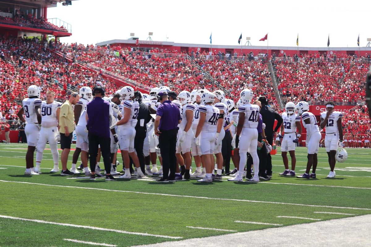 Northwestern%E2%80%99s+team+huddles+together+during+a+pause+against+Rutgers.+The+Wildcats+host+Minnesota+under+the+lights+at+Ryan+Field+on+Saturday+night+in+NU%E2%80%99s+Big+Ten+home+opener.
