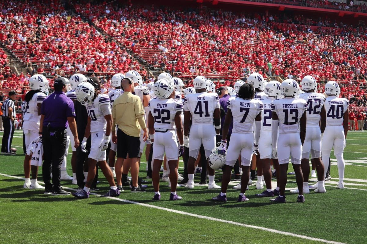 Northwestern+regroups+during+a+stoppage+in+play+against+Rutgers.