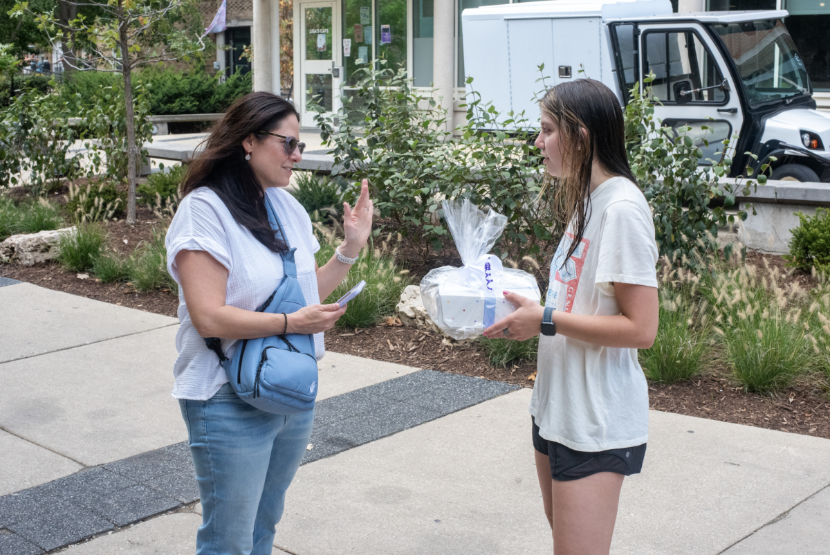 Heather Metz (left) talks with McCormick freshman Liv Bernstein (right). Metz launched a Northwestern outpost of mindyKNOWS, a St. Louis-founded business where parents can subscribe to have a local available to assist their college student.