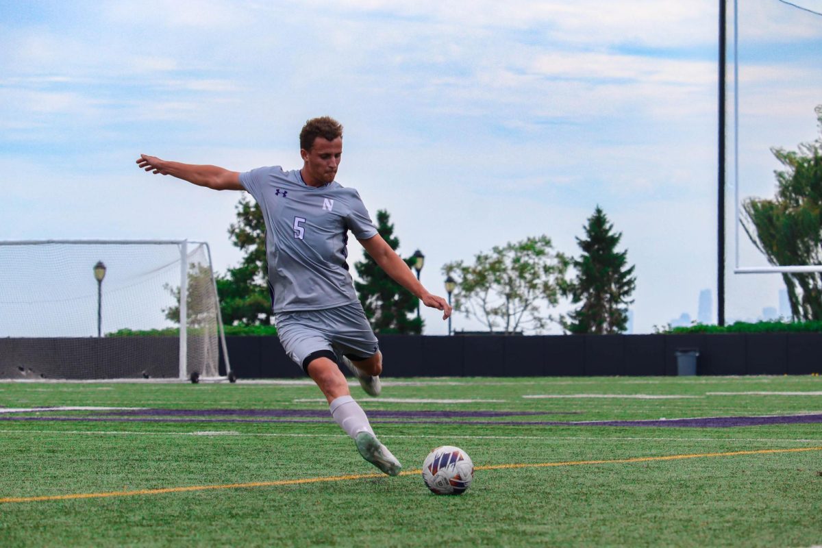 Graduate student defender Reese Mayer kicks the ball. Northwestern’s men’s soccer team slotted in at 16th in the country in the latest United Soccer Coaches poll. 
