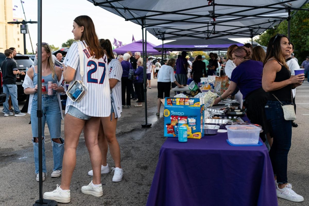 Fans tailgate outside of Ryan Field before Northwestern’s game against Minnesota Saturday.
