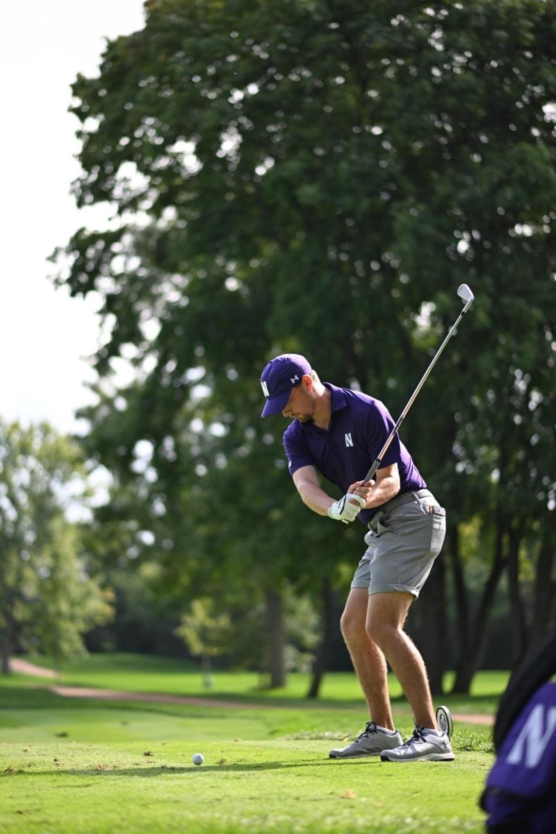 Junior Cameron Adam hits the ball. Adam finished tied for 36th at the Fighting Irish Classic.
