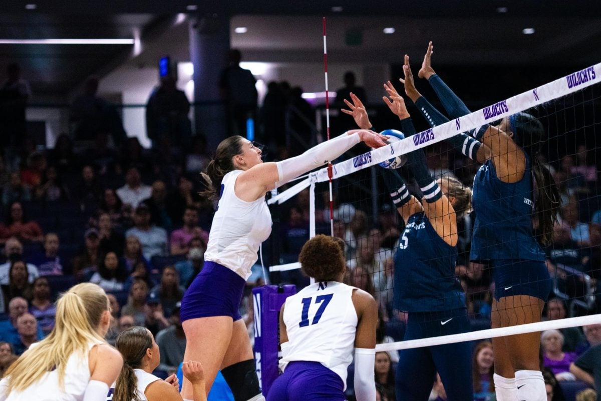 Graduate outside hitter Julia Sangiacomo making a play at the net. Sangiacomo posted a total of 48 kills in matches against Michigan and Michigan State this weekend.
