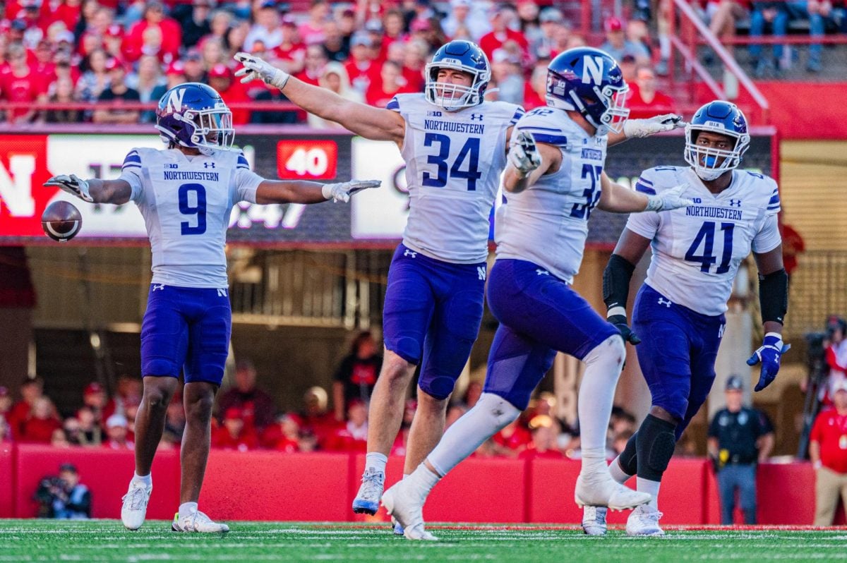 Northwestern’s defense celebrates following a forced incompletion in last week’s defeat to Nebraska. Ahead of its matchup with Maryland on Saturday, NU believes in its ability to quickly bounce back and reach .500 once again. 