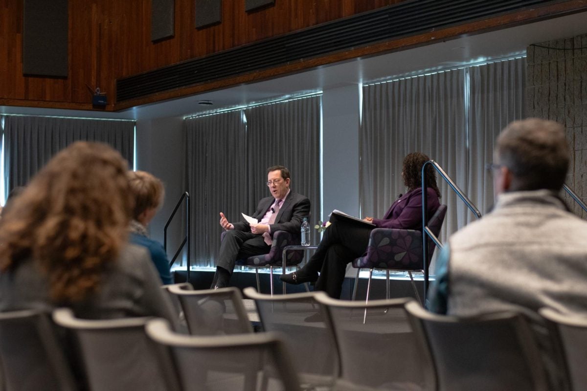 About 100 staff members attended the fireside chat with University President Michael Schill in Norris University Center Tuesday afternoon.