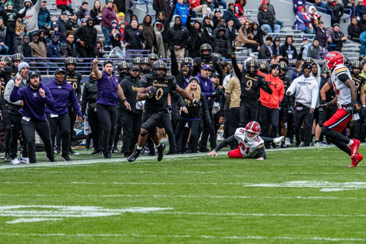 Redshirt senior defensive back Coco Azema returns a kickoff along the sideline against Maryland on Saturday. Azema caught the game winning interception versus the Terrapins.