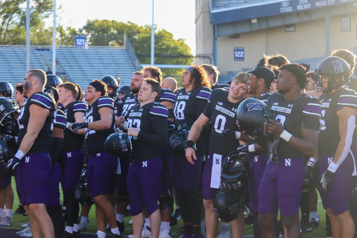Northwestern celebrates its win against Howard. Sitting 3-3 at its bye week, NU will hit the road to Lincoln to face Nebraska on Oct. 21. 
