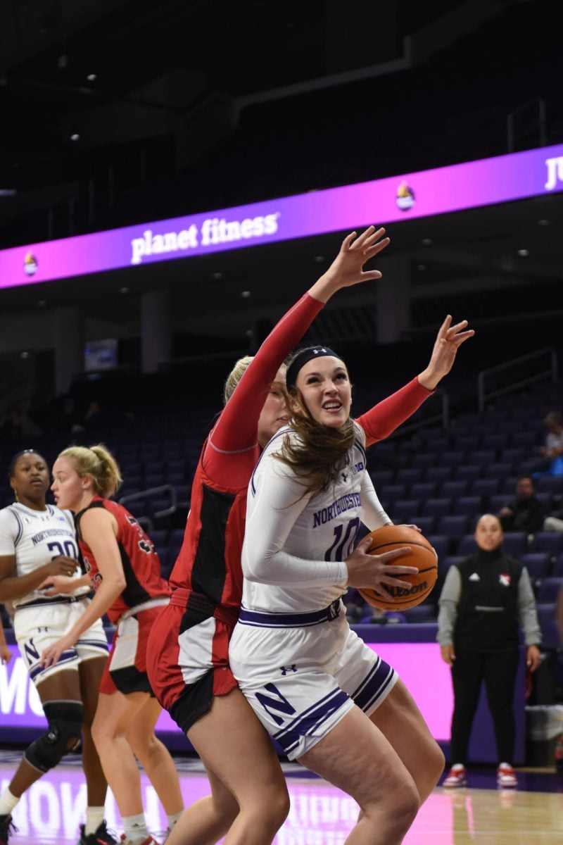 Junior+forward+Caileigh+Walsh+fights+to+get+to+the+basket+in+a+game+earlier+this+season.+Walsh+scored+a+career-high+27+points+in+Northwestern%E2%80%99s+win+against+Southeast+Missouri+State+on+Sunday.