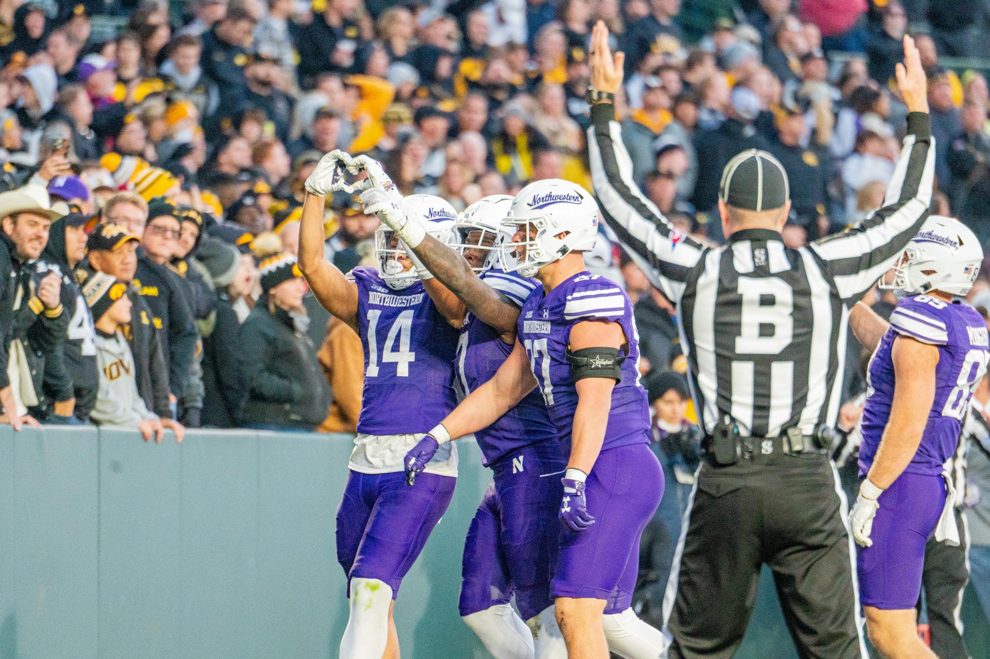 Sixth-year wide receiver Cam Johnson celebrates following a score. In Saturday’s 45-43 victory over Illinois, Johnson had a career-high 124 receiving yards and increased his touchdown streak to four games. 