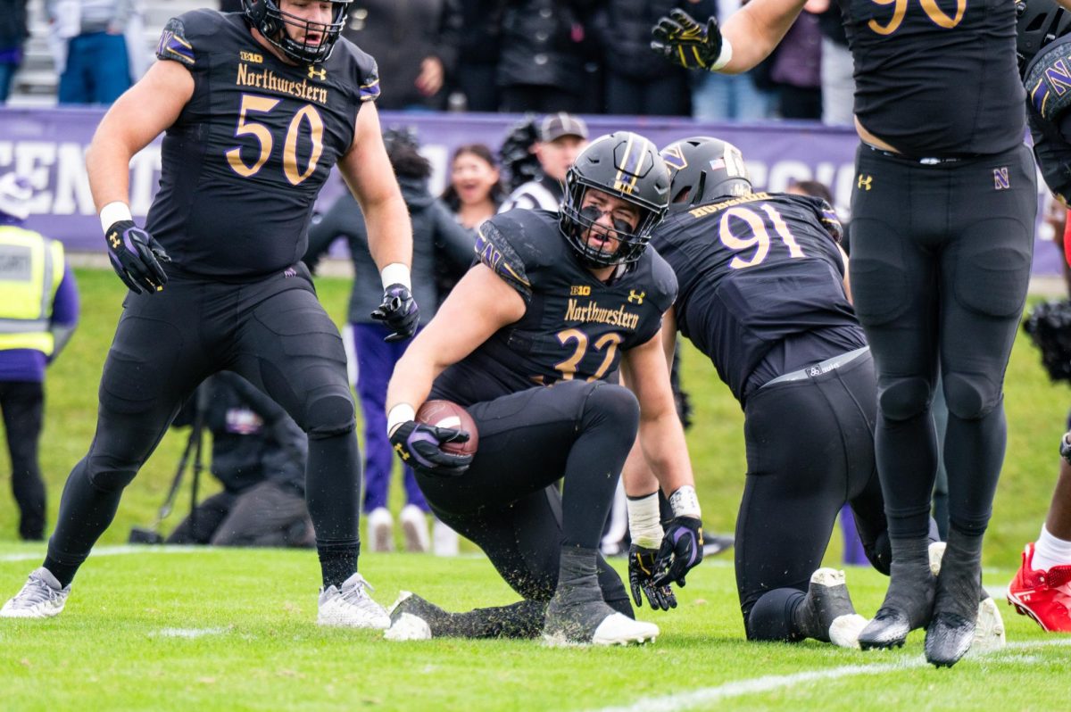 Northwestern+senior+linebacker+Bryce+Gallagher+gets+pumped+up+after+recovering+a+fumble+in+the+first+quarter+against+Maryland.