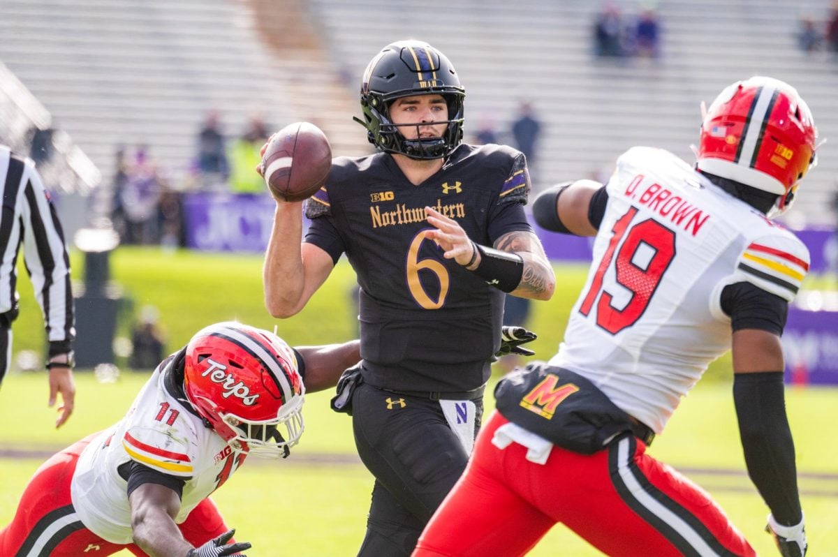 Northwestern+junior+quarterback+Brendan+Sullivan+scans+the+field+before+making+a+play.+The+quarterback+had+a+career-high+with+265+passing+yards+against+Maryland.