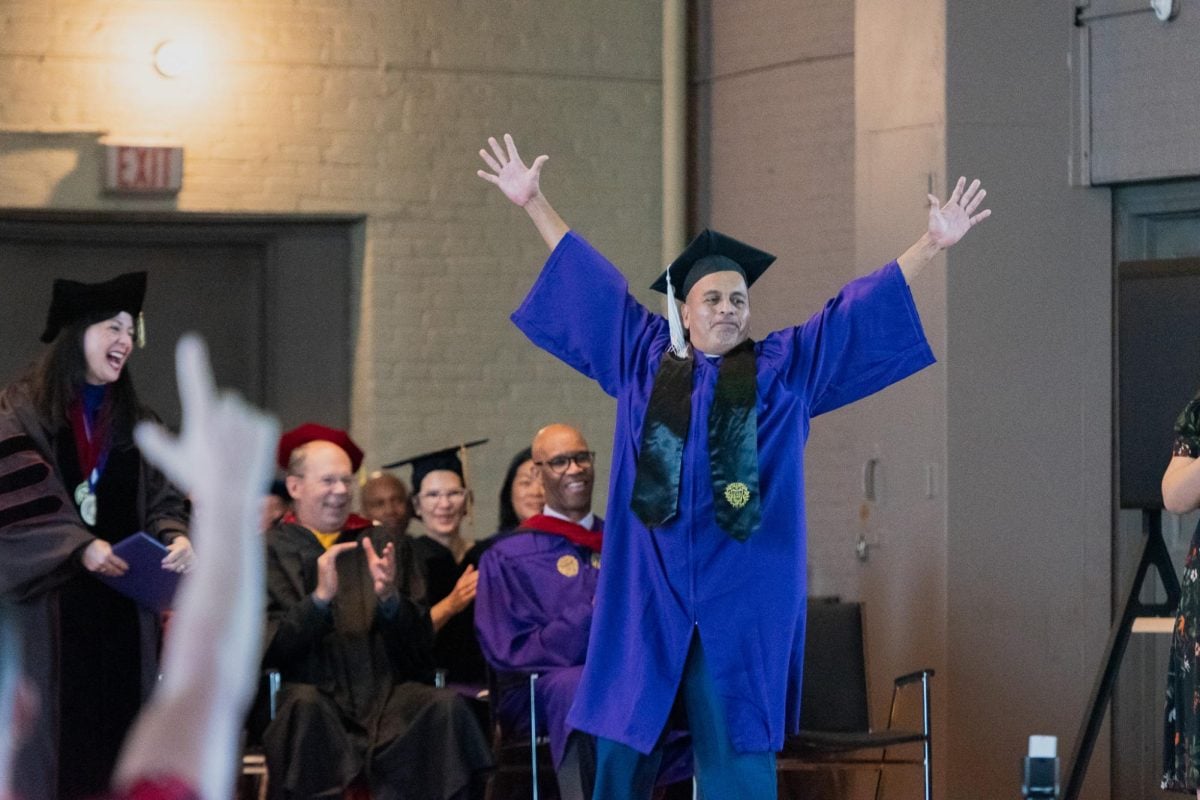 NPEP graduate James Soto celebrates after receiving his degree. Wednesday’s graduating cohort marked the first time incarcerated students have received bachelor’s degrees from a top 10 university.