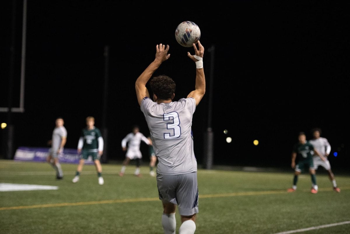 Junior defender Ibrahim Obeid prepares to restart play with a throw. Obeid stepped into the starting right back slot following freshman defender Bryant Mayer’s injury against Green Bay last month.