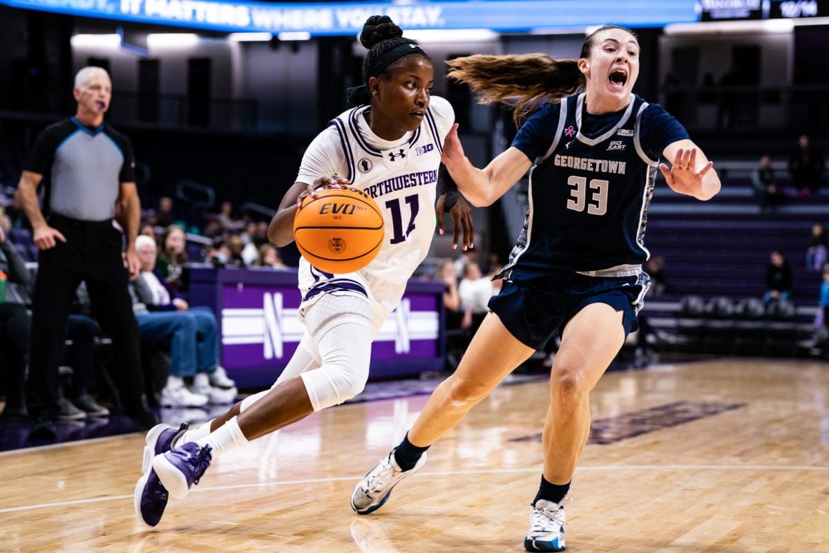 Junior+guard+Hailey+Weaver+drives+baseline.+Weaver+tallied+nine+points%2C+two+rebounds+and+two+assists+in+Northwesterns+71-58+loss+to+Maryland.