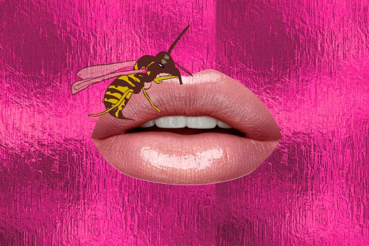 A bee lands on lips.