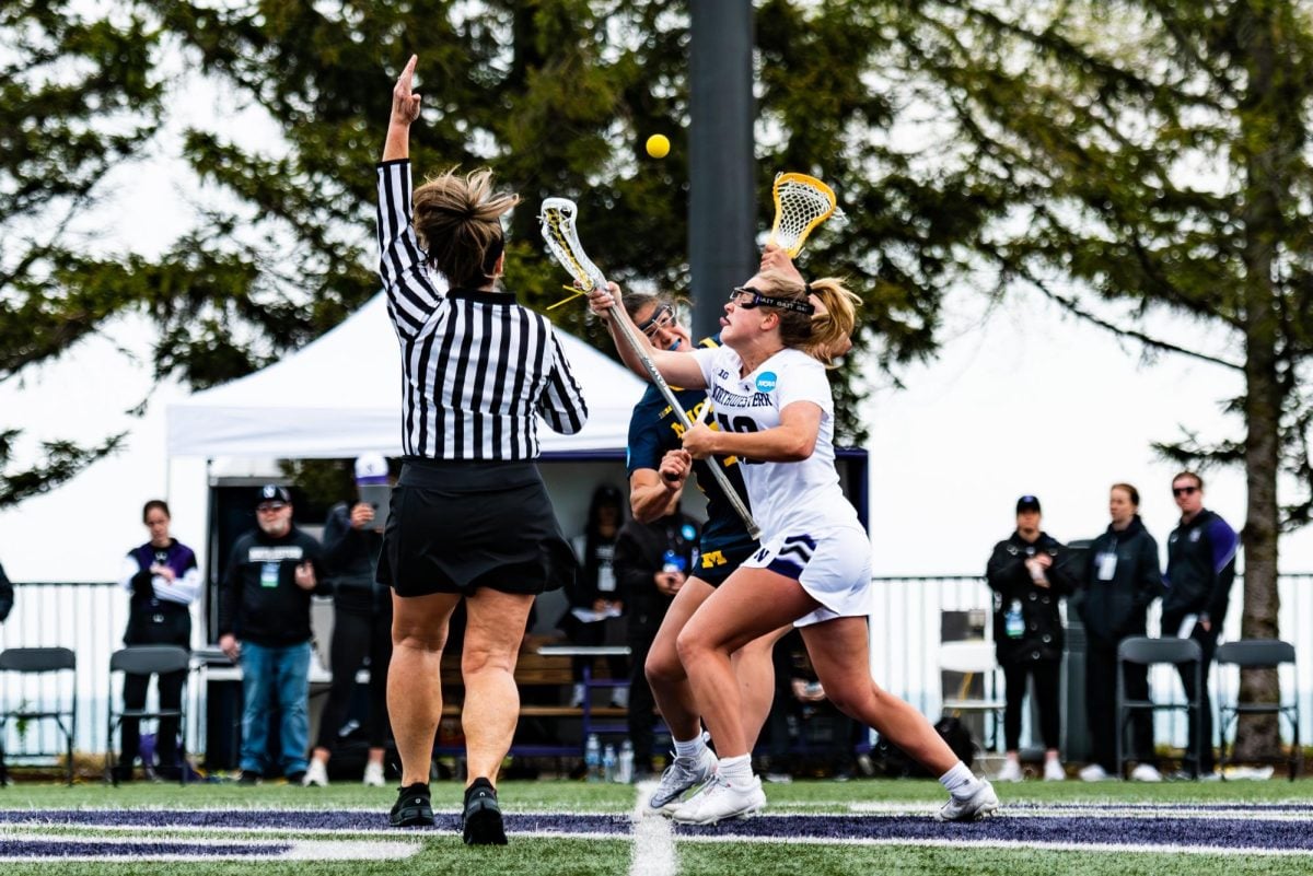 Junior midfielder Samantha Smith attempts a draw during last season’s NCAA Tournament game against Michigan. She is primed to return as Northwestern’s primary draw taker this season.