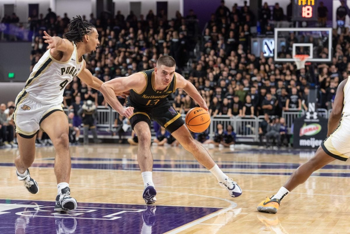 Junior guard Brooks Barnhizer looks to create separation against Purdue. Barnhizer poured in a career-high 24 points against Nebraska Saturday.