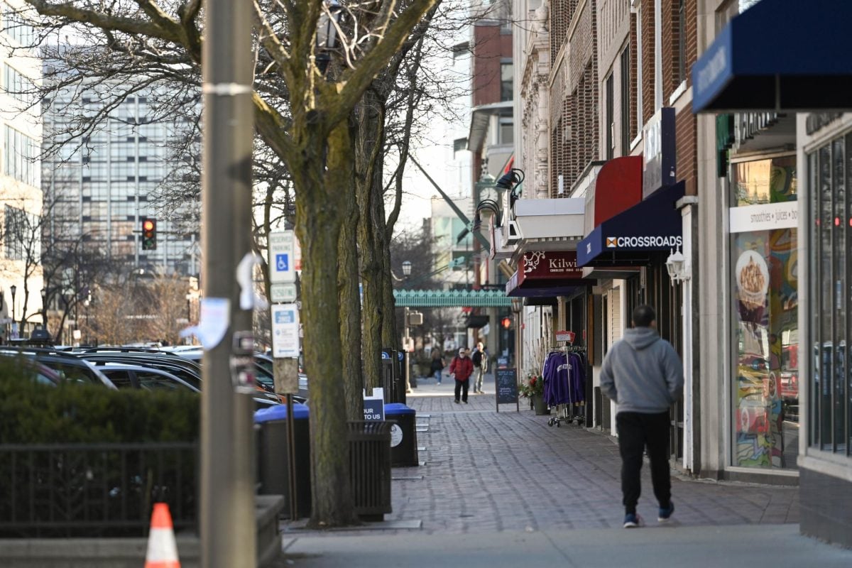 People walk in downtown Evanston on Thursday, Feb. 29. A new grant program could help still-struggling local businesses cover their expenses.
