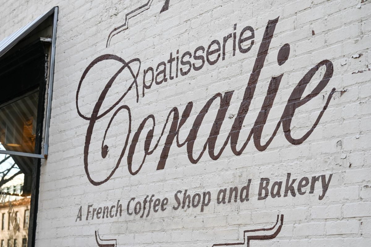Patisserie Coralie sign on the wall.