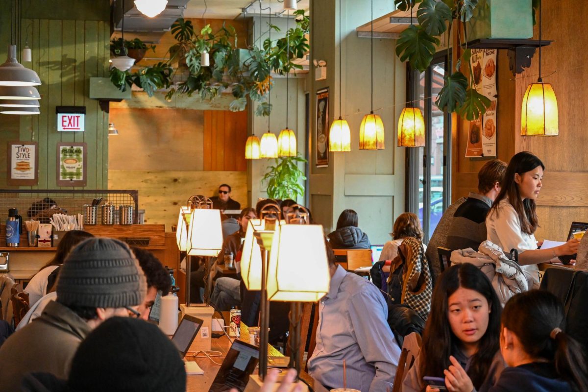 People study and work at Colectivo Coffee.