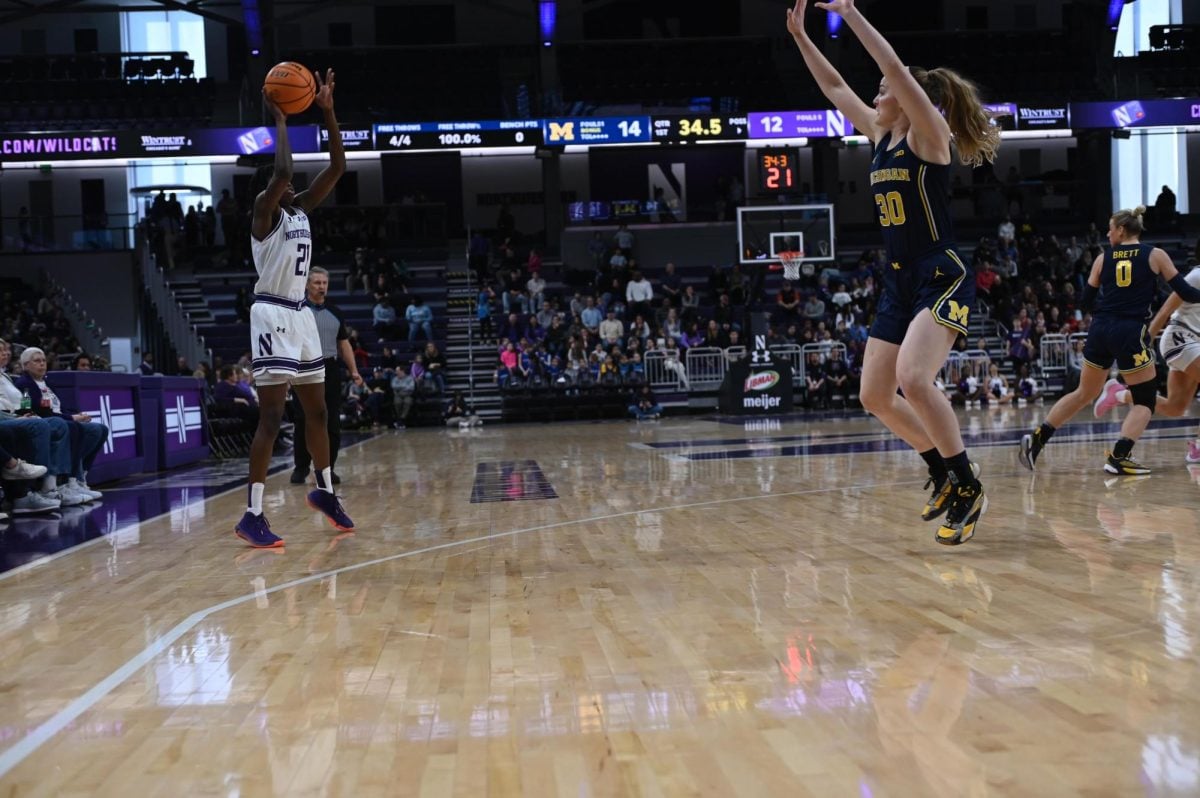 Junior guard Melannie Daley surveys her options from beyond the arc.