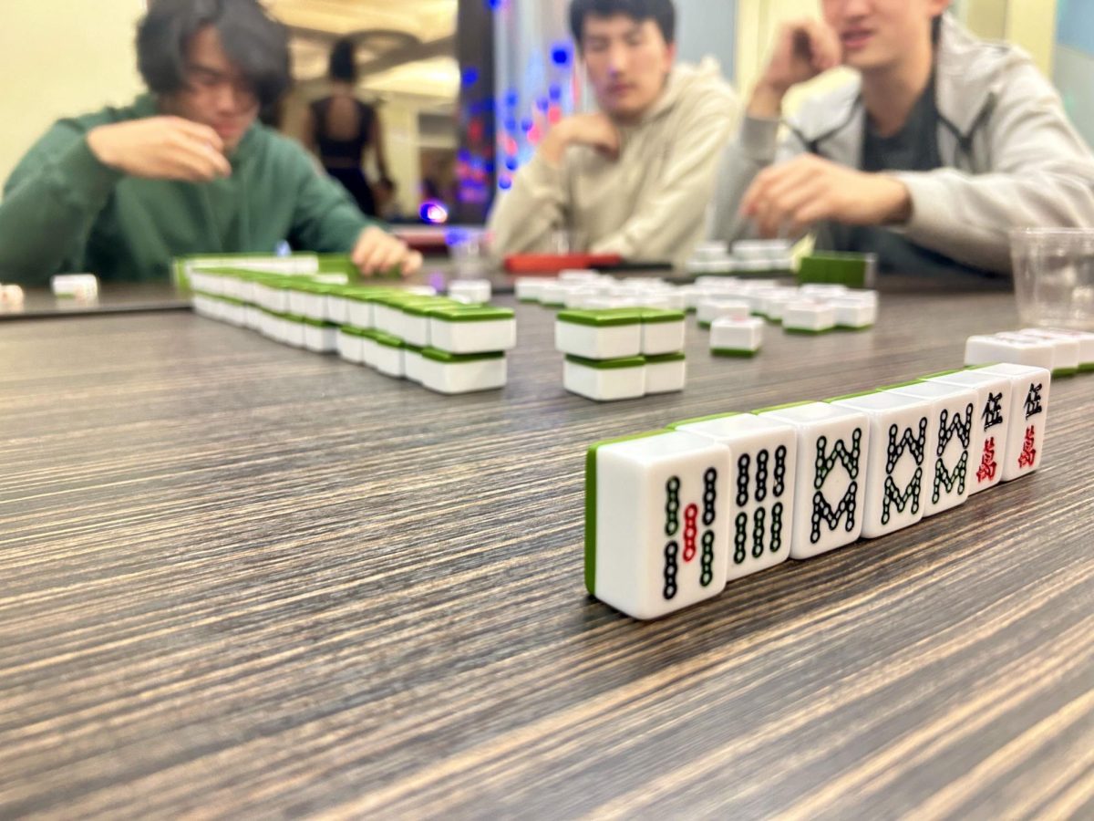 Students enjoyed a round of Mahjong at Game Gala as they snacked on charcuterie and Italian soda.