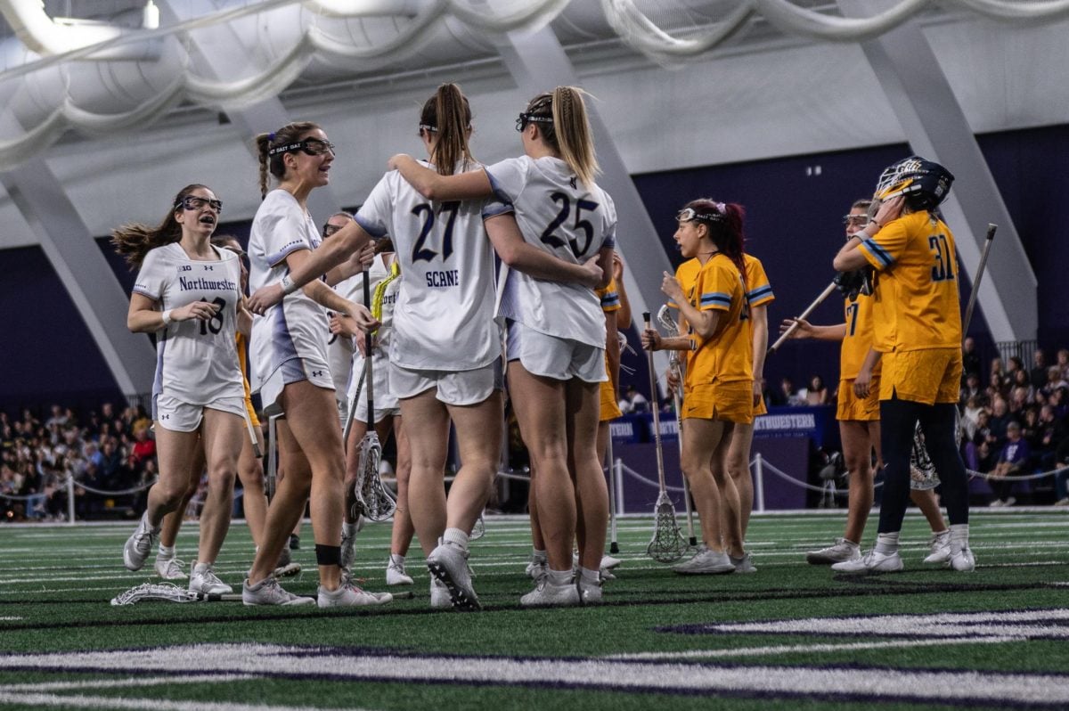 Northwestern’s attack celebrates a goal against Marquette Monday. The ‘Cats will face No. 20 Colorado in Boulder Thursday.