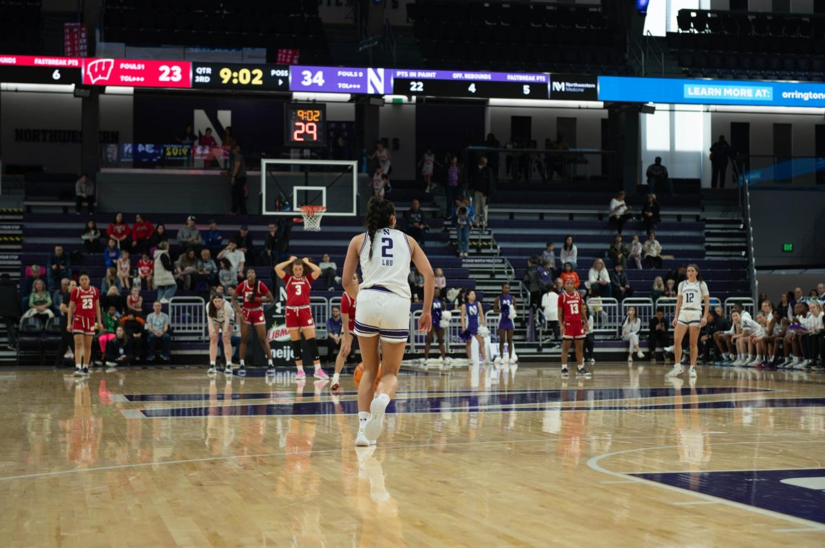 Northwestern Women’s Basketball Point guard Caroline Lau dribbles the ball up the court.