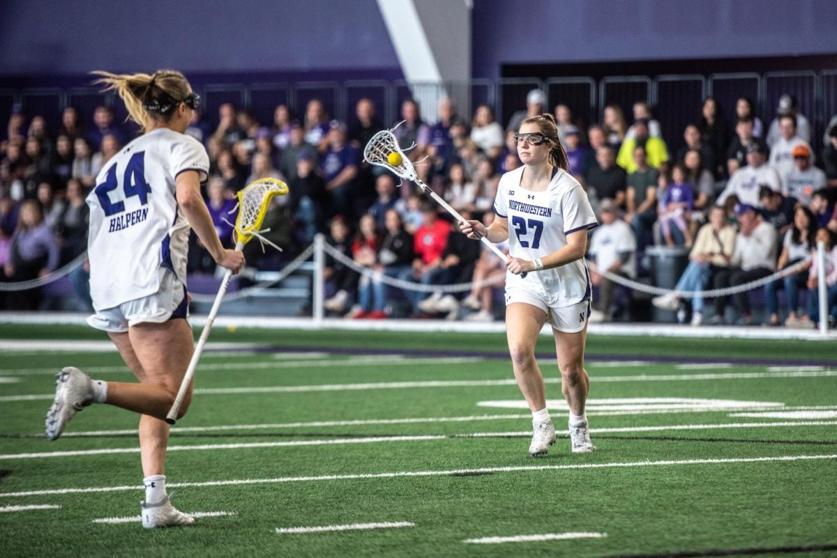 Graduate+student+attacker+Izzy+Scane+holds+the+ball+in+the+offensive+zone.+Scane+scored+a+season-high+seven+goals+against+No.+12+Johns+Hopkins+Saturday.