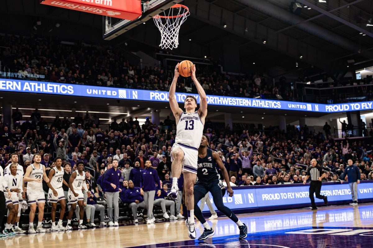 Junior guard Brooks Barnhizer elevates to dunk the ball against Penn State. Barnhizer was named to the Big Ten All-Defensive Team and received a third-team all-conference nod. 