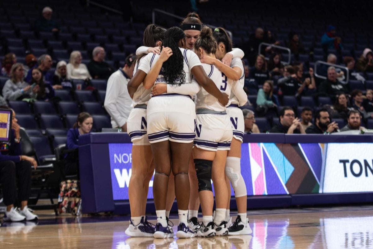 Northwestern huddles during a game against Penn State last year.