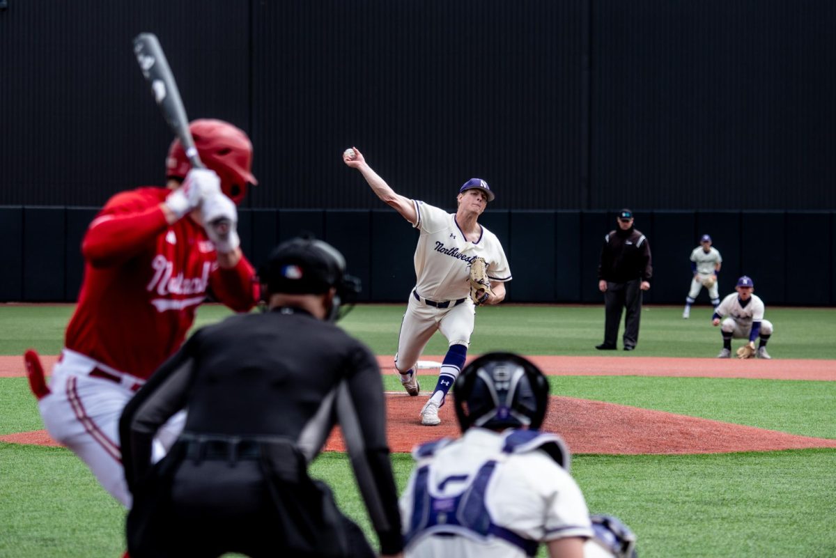 Northwestern starting pitcher Kyle Potthoff throws a pitch.