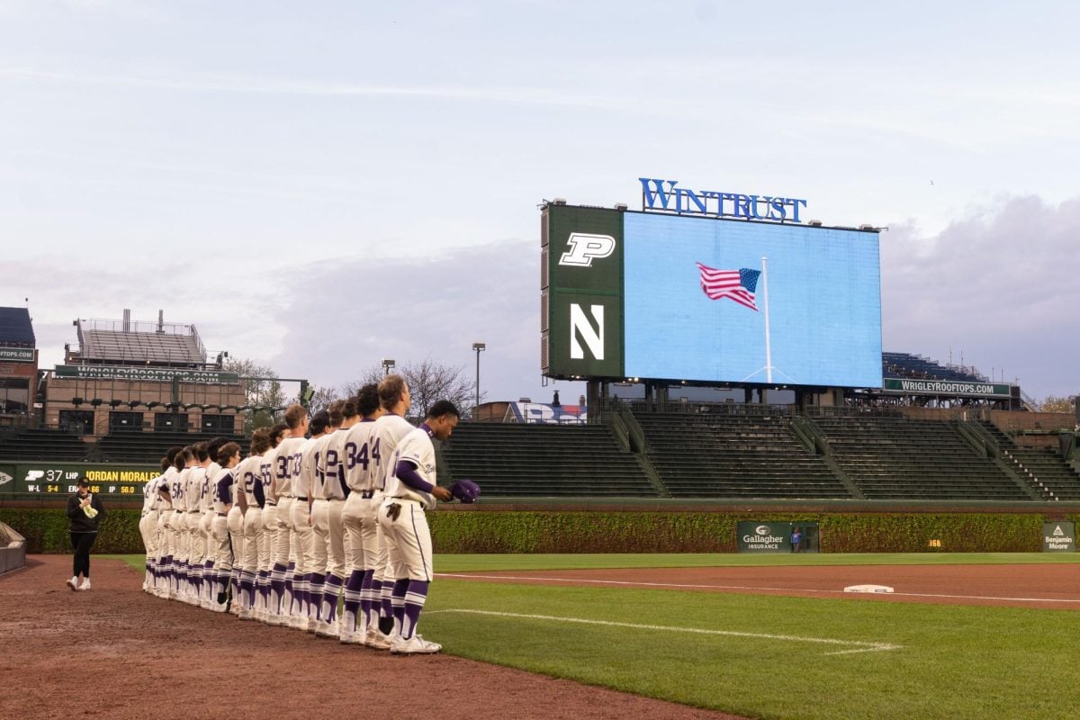 Northwestern+lines+up+for+the+national+anthem.